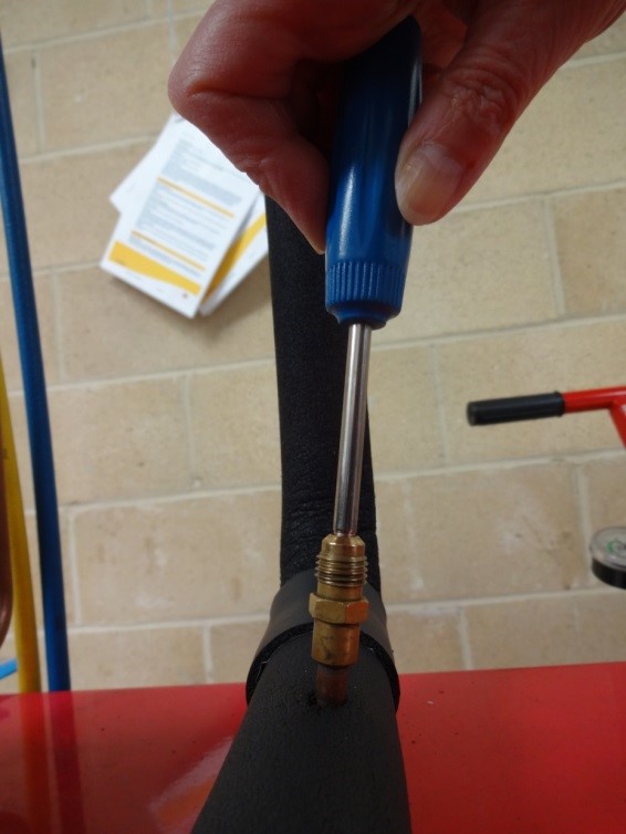 Schrader valve torque tool