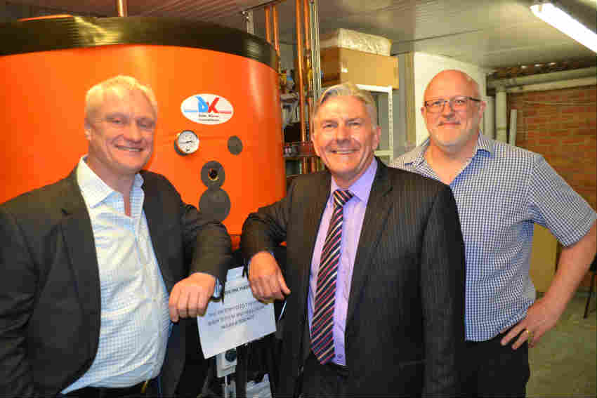 Graham Stuart, Ken Riley and Nigel Upson in front of the DK Heat Recovery water tank installed at Soanes Poultry