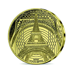 One side of coin depicting the structure of the Eiffel Tower