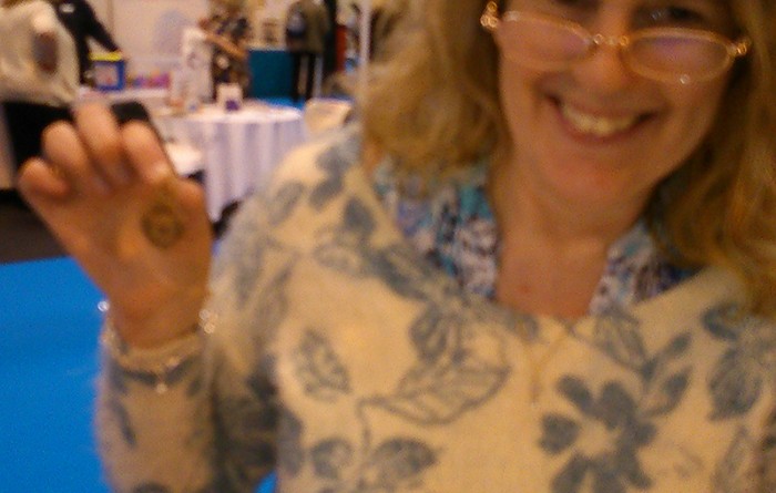 At the end of WW1 many local communities clubbed together to buy thank you gifts for their returning servicemen. Here Sarah Lee shows a valuable solid gold example, presented by Barrow in Furness.