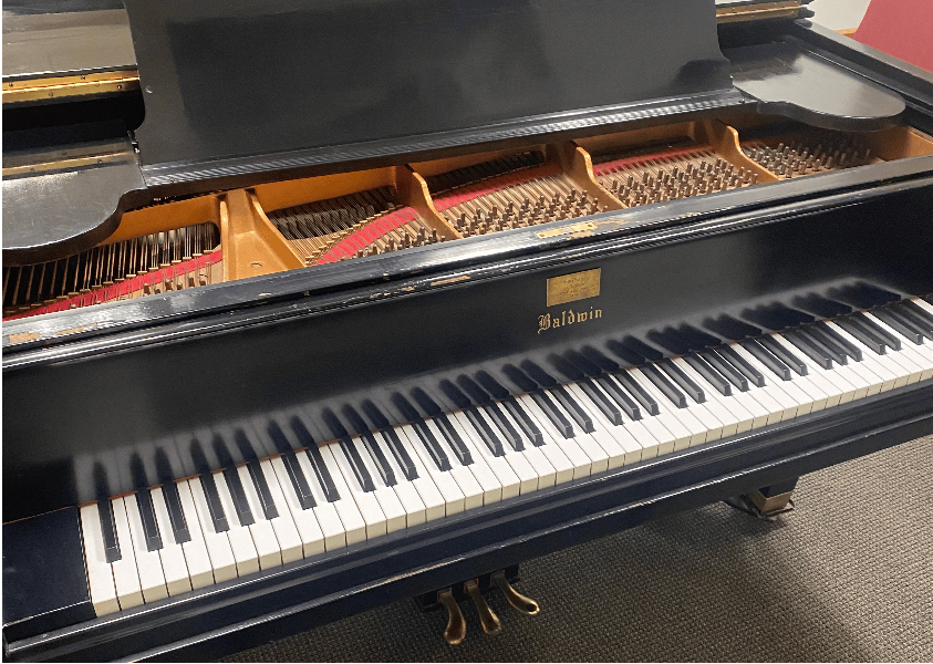 Pianos belonging to Freddie Mercury and John Lennon set to