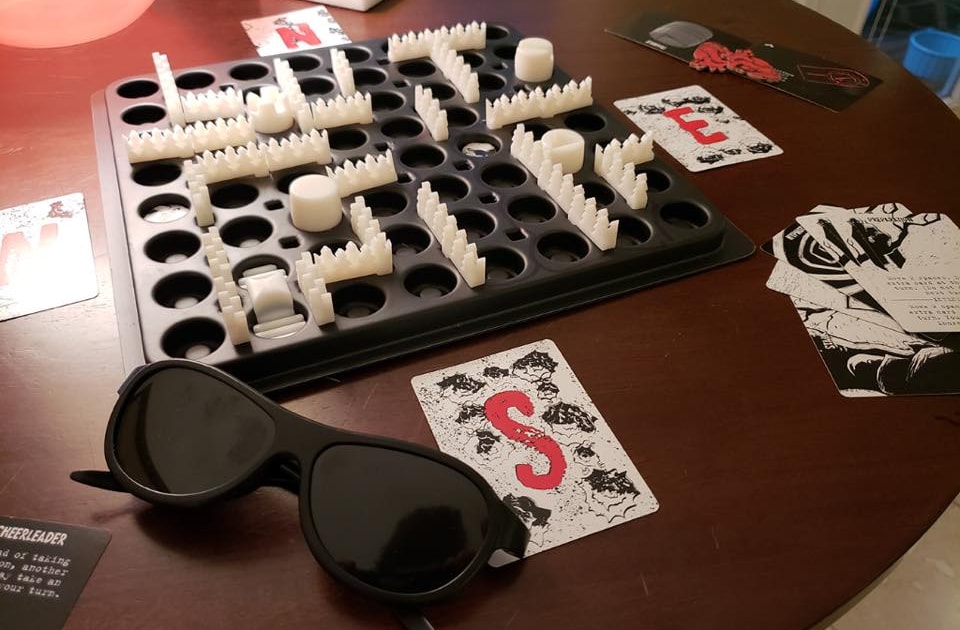 Board game that you play blindfolded and must escape an axemurderer in